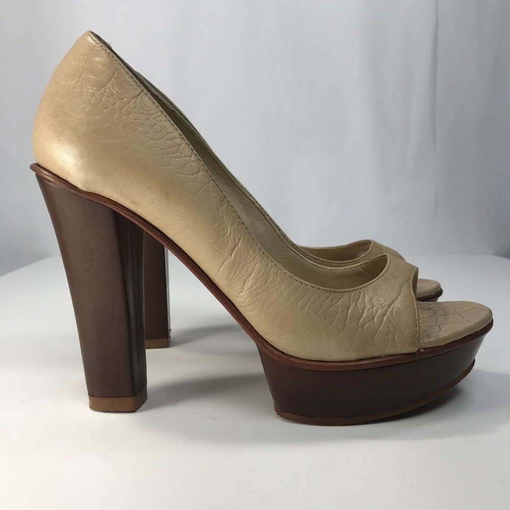 SCHUTZ embossed leather peep toe pumps.